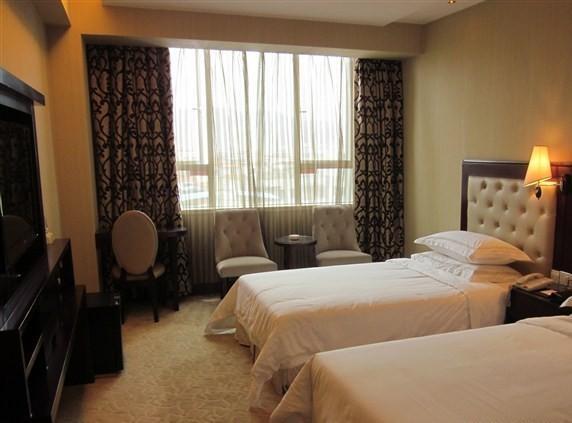 Vienna Hotel In Pinghu Square Shenzhen Rom bilde